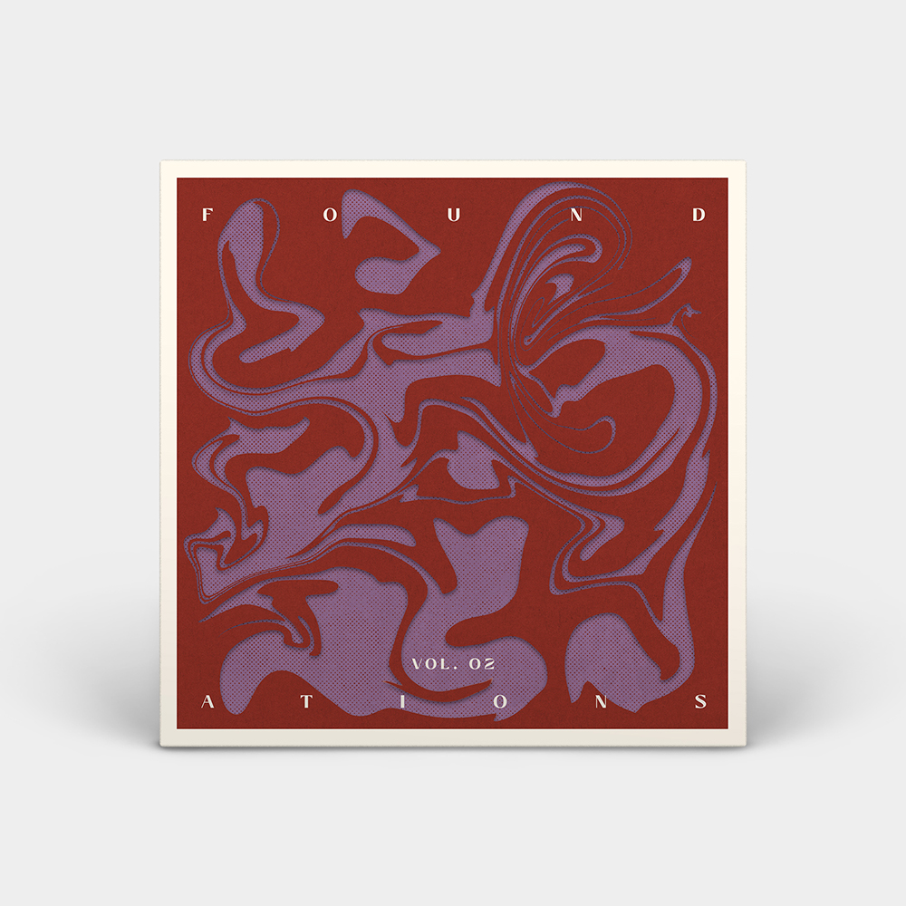 Album cover made to look 3d so it’s standing upright with a light grey background. The cover is purple with a grid of black dots covering it. There is a layer of red over top is a swirly pattern that shows the purple through the breaks, the red has a drop shadow to make it look 3D. There is white text on top of that that reads “FOUND’ at the top, “ATIONS” at the bottom and in smaller type towards the bottom “VOL. 2”.