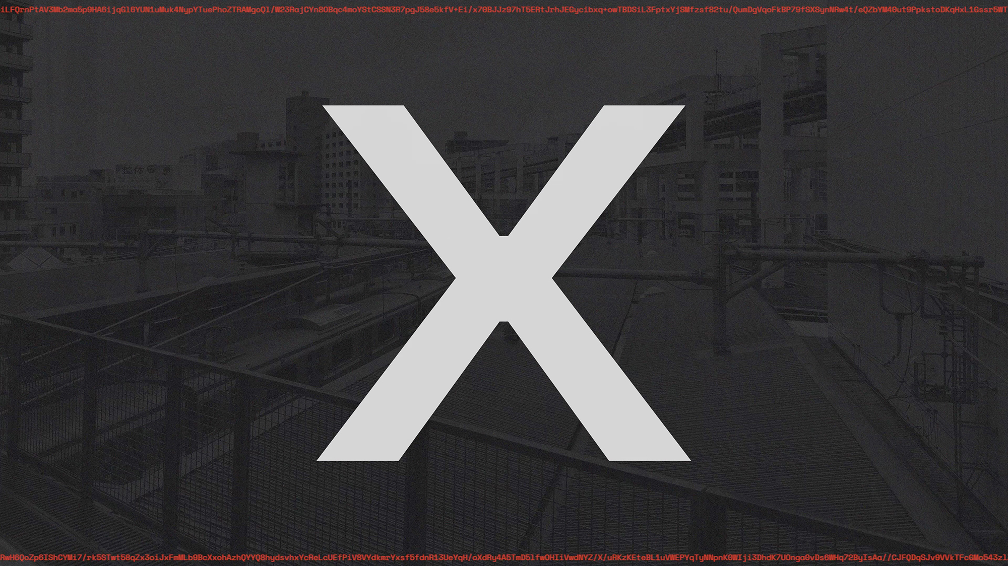 A video still from the video for 'c0n73x7_c0ll4p53'. The background is a dark grey photograph looking out over a train yard in Chiba. On the top and bottom edge is small red text that is just strings of characters, its encrypted text. In the venter is a massive white X.